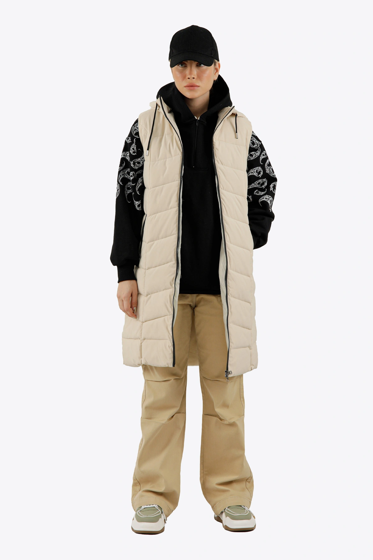 پافر شمعی زنانه رنگ رنگ کرم ، پافر بلند کلاهدار جداشونده توسط زیپ. 