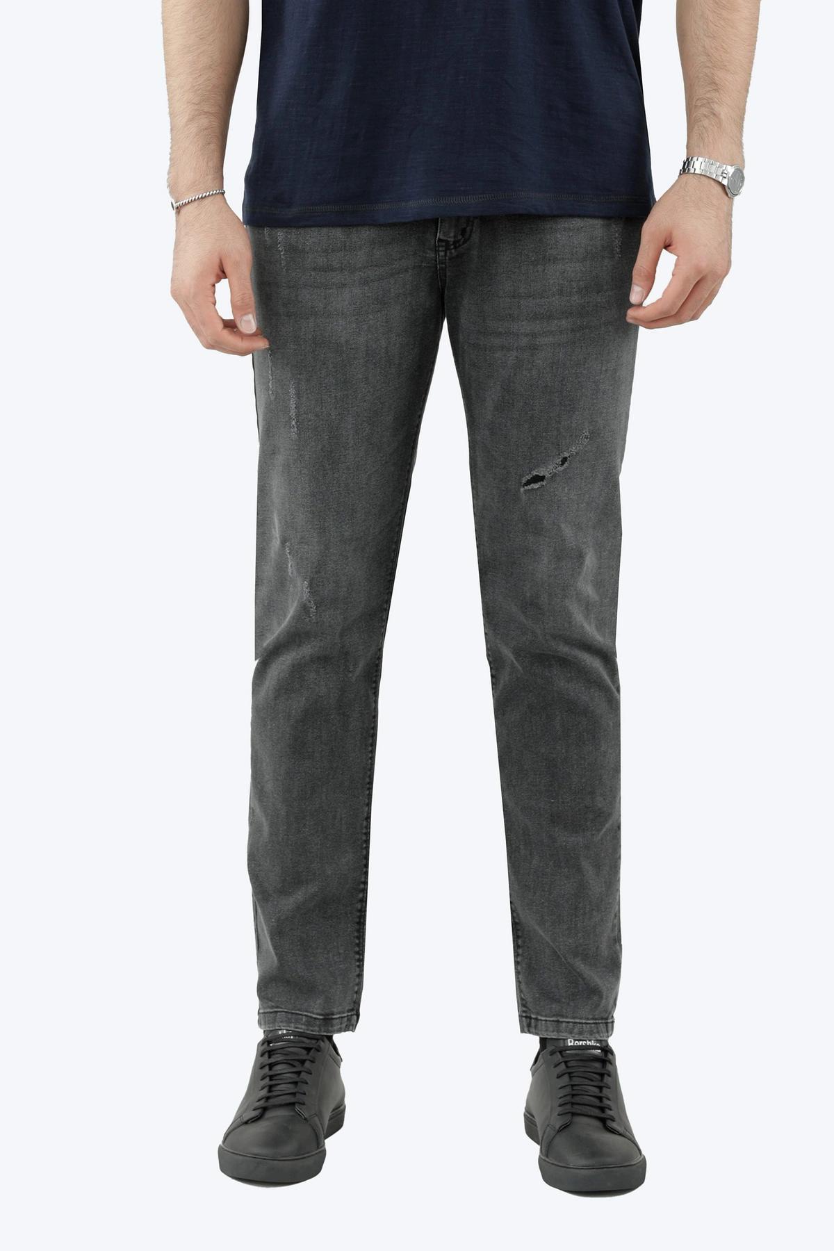 شلوار جین مردانه مدل راسته نیمه جذب رنگ مشکی زاپدار از برند پاتن جامه خرید آسان با ارسال رایگان. 