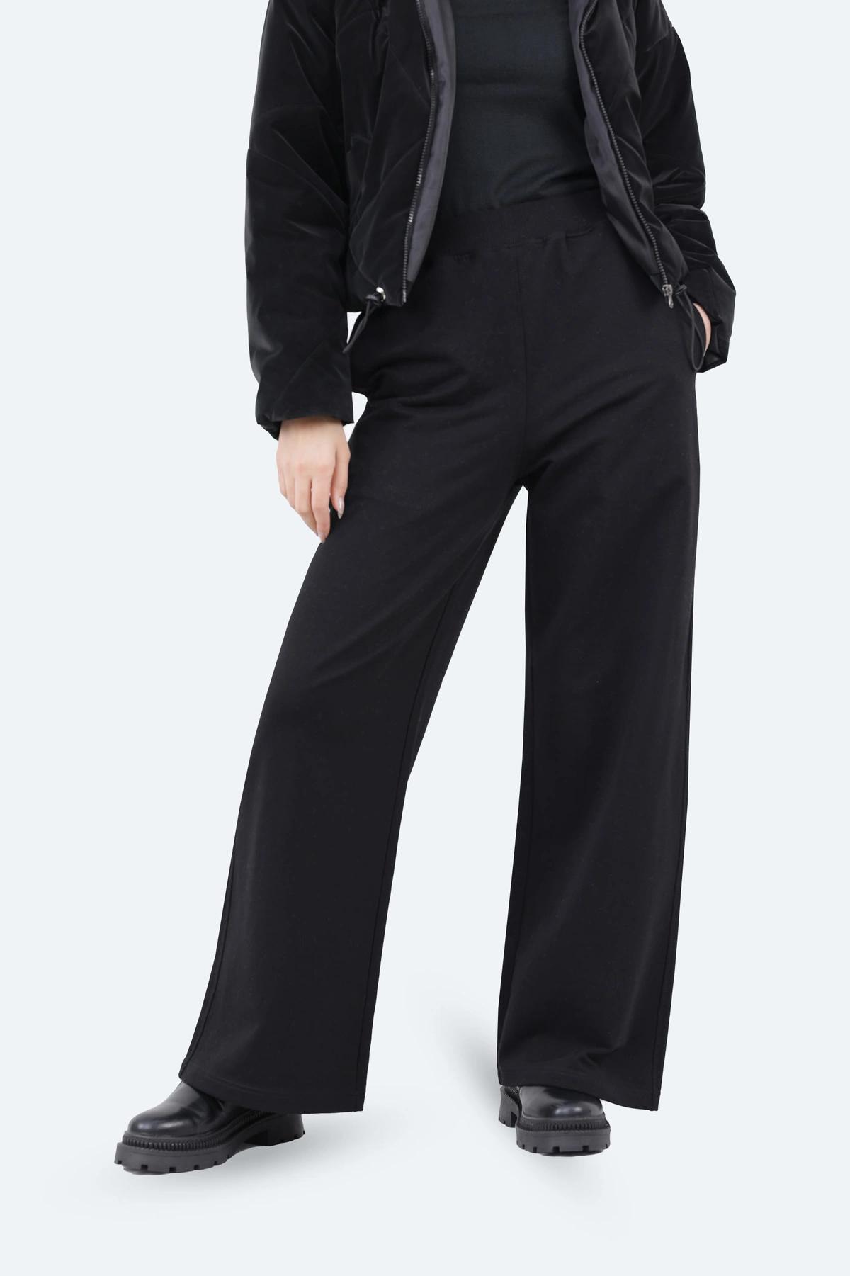 شلوار بگ زنانه تریکو رنگ مشکی ، شلوار مدل بگی از پارچه تریکو ارسال رایگان به سراسر کشور. 