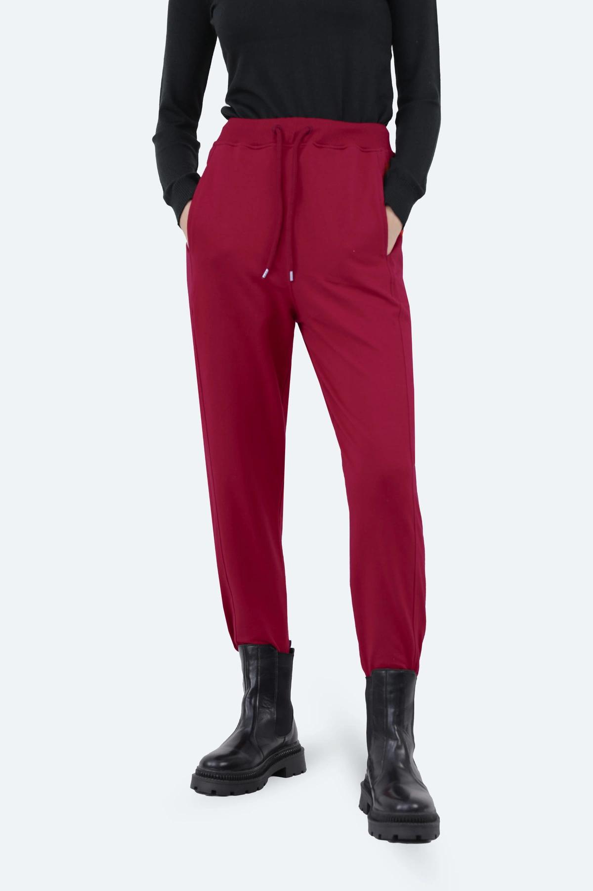 شلوار اسلش زنانه ، شلوار تریکو رنگ کرم زرشکی، کمرکشدار و دمپا کشی ، خرید آسان با ارسال رایگان. 