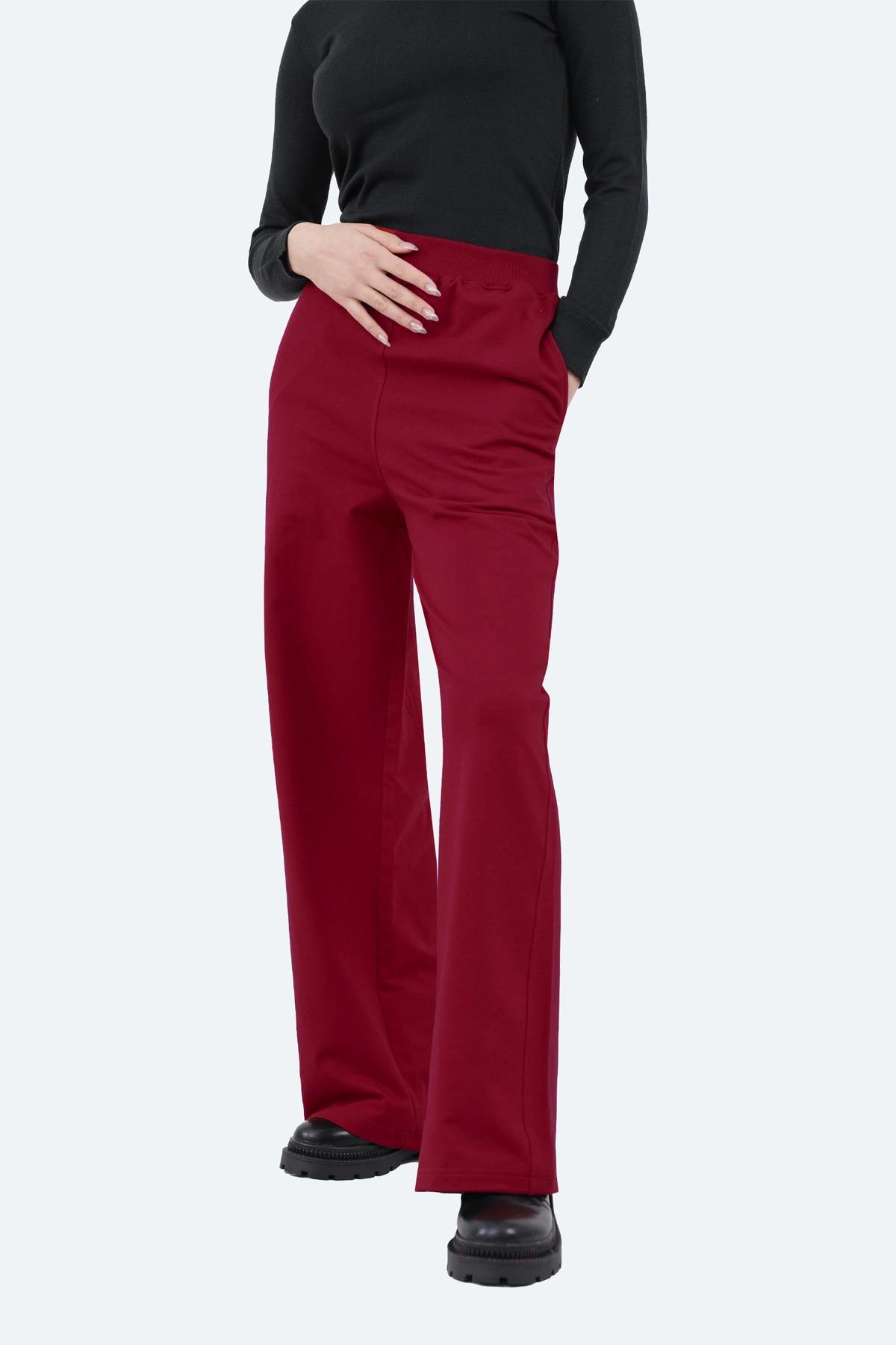 شلوار بگ زنانه تریکو رنگ زرشکی ، شلوار مدل بگی از پارچه تریکو ارسال رایگان به سراسر کشور. 