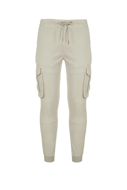 شلوار شیش جیب مردانه رنگ کرم برند پاتن جامه مدل شش جیب. 