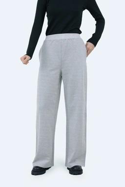 شلوار بگ زنانه تریکو رنگ ملانژ (طوسی روشن) ، شلوار مدل بگی از پارچه تریکو ارسال رایگان به سراسر کشور