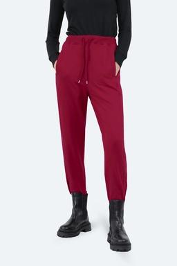 شلوار اسلش زنانه ، شلوار تریکو رنگ کرم زرشکی، کمرکشدار و دمپا کشی ، خرید آسان با ارسال رایگان. 