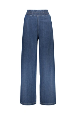 شلوار جین کمرکشدار زنانه مدل بگی رنگ آبی نسبتاً تیره